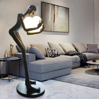Black fiberglass humanoid sculpture lamp